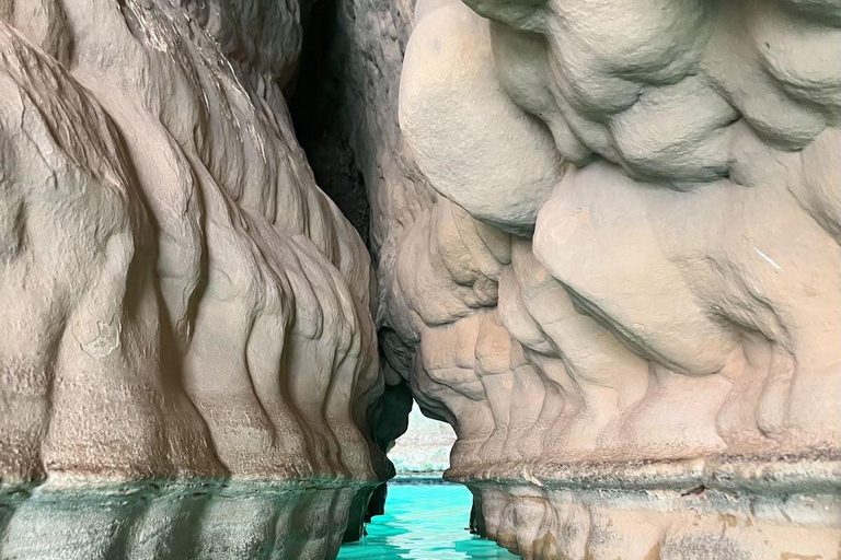 From Muscat: Private Wadi Shab & Bamah Sinkhole Day Trip Wadi Shab Adventure & Bamah Sinkhole –Oman’s Natural Wonders