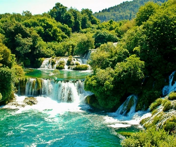 From Zadar: Krka Waterfalls Day Tour with Boat Ride & Guide