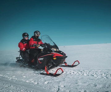 From Alta: Daytime Snowmobile Adventure