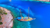 Cesme, recorrido en bote de grupo pequeño con almuerzo de buffet abierto - Housity