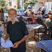 Paphos Akamas Blue Lagoon Bus Boat Tour With Water Slide Getyourguide