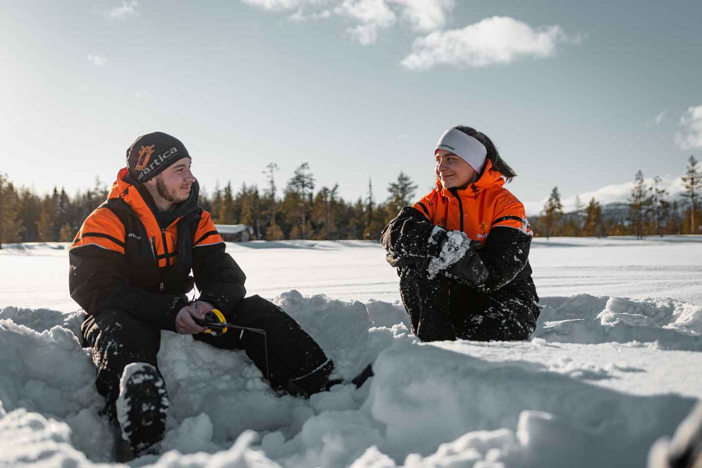 Ylläs: Snowmobile Adventure with Ice Fishing