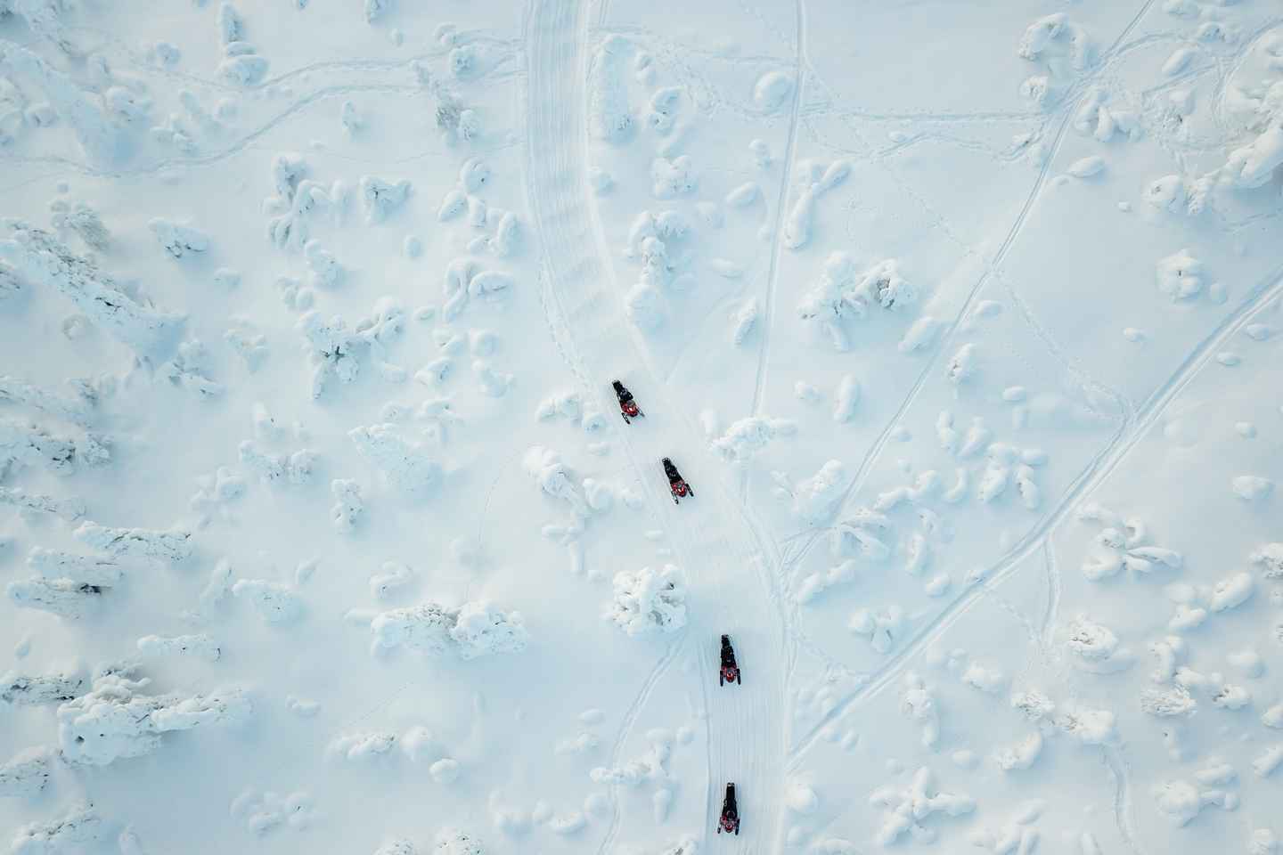 Ylläs: Snowmobile Adventure with Ice Fishing