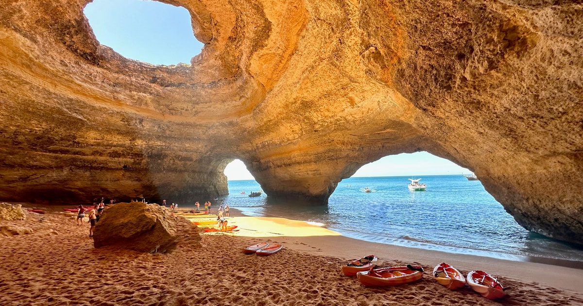 From Albufeira Guided Benagil Kayak Tour w/ hidden caves GetYourGuide