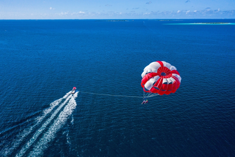 From Safaga: Glass Boat and Parasailing with Watersports Soma or Safaga: Glass Boat and Parasailing with Watersports