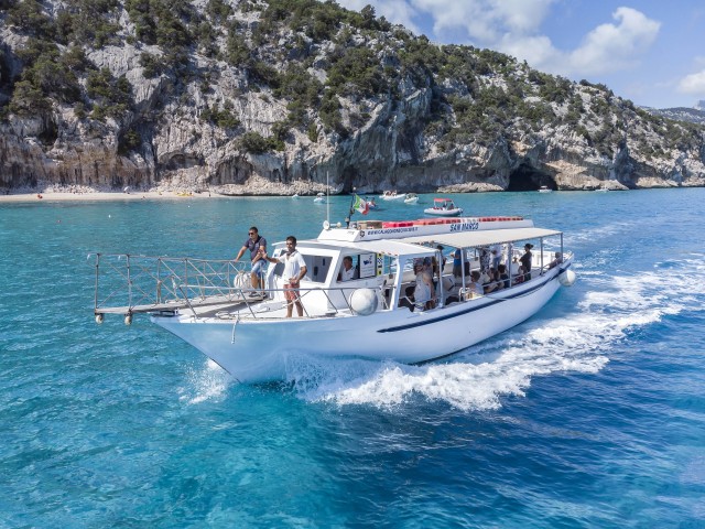 Visit Cala Gonone Gulf of Orosei Boat Tour with Aperitif in Sardinia