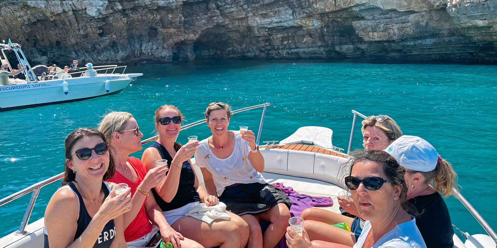 Polignano a Mare: Speedboat Cruise to Caves with Aperitif | GetYourGuide