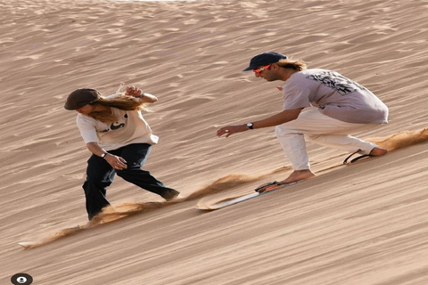 Excursion d'une demi-journée à Agadir dans le désert du Sahara à dos de chameau et en planche à sable