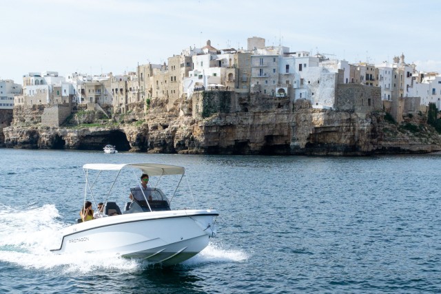 Visit Polignano a Mare Caves and Grottos Tour by Boat with Spritz in Castellana Grotte