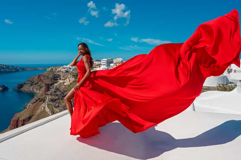 Santorini: Unique Flying Dress Photoshoot Experience | GetYourGuide