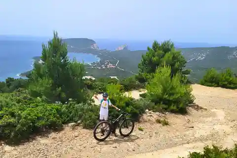 From Alghero: Le Prigionette Oasis Guided E-Bike Tour