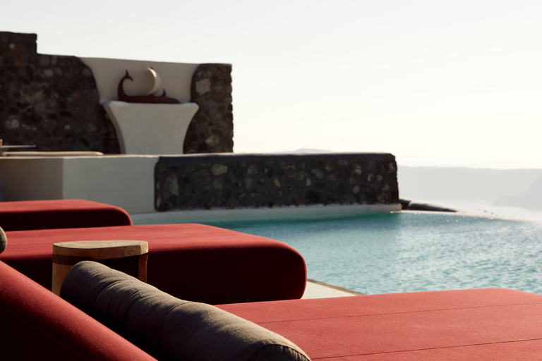 Daybed Relaxation with infinity pool use with caldera views