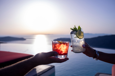 Daybed Relaxation with infinity pool use with caldera views