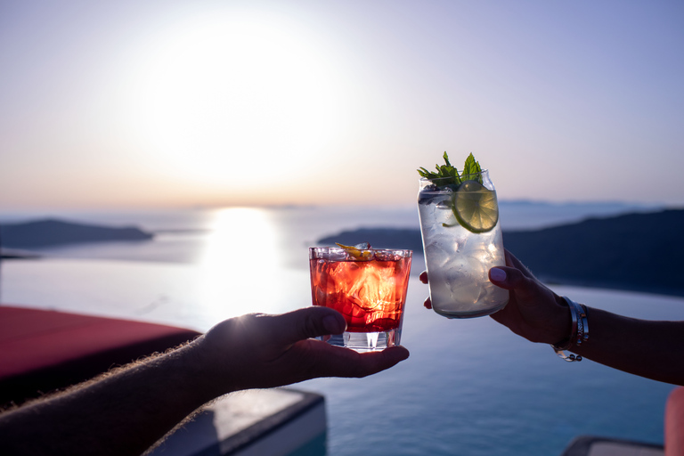 Daybed Relaxation with infinity pool use with caldera views