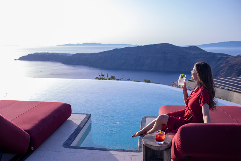 Daybed Relaxation with infinity pool use with caldera views