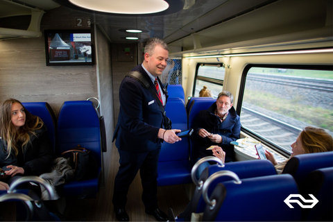 Amsterdam: Treintransfer Schiphol Airport van/naar AmsterdamSingle van Amsterdam naar Schiphol Airport - First Class