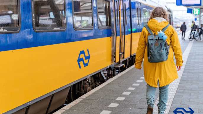 Amsterdam: Traslado en tren del Aeropuerto de Schiphol a/desde Amsterdam