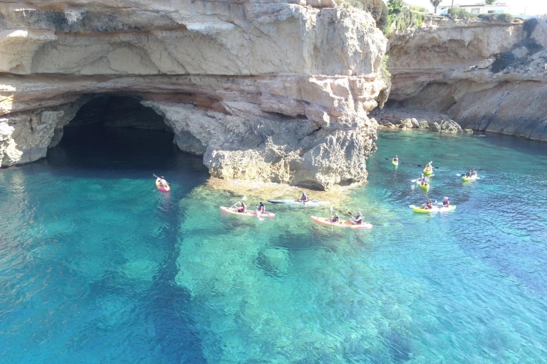 Ibiza: Sea kayaking and snorkeling in Cala Codolar Sunset Kayak & Snorkel session with Cava