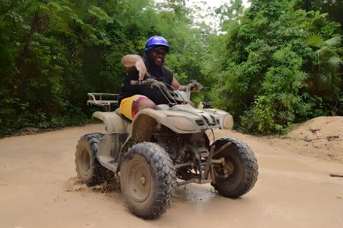 Excursión de medio día a la selva de Rivera Maya: ATV, tirolinas y baño en cenote