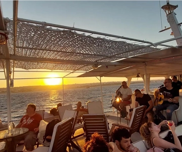 Rhodes: Sunset Cruise with Live Music, Wine & Greek Buffet