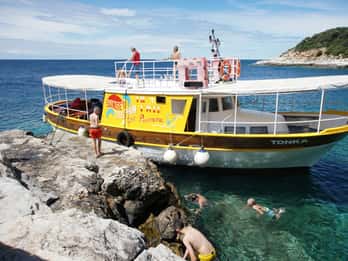 Tour in barca delle isole di Rovigno con nuoto