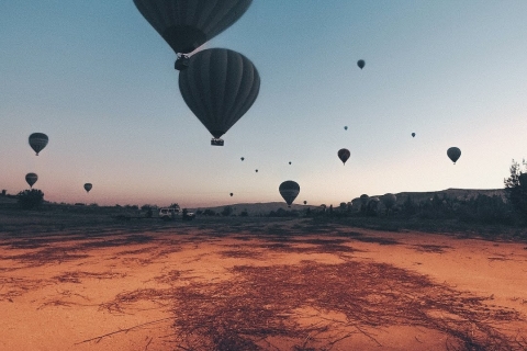 Hot air balloons in Goreme red valley