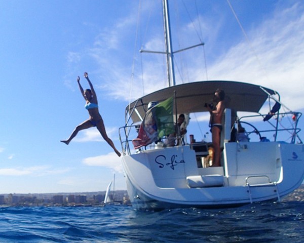 Visit Catania Coastline Sailing Trip with Appetizer and Prosecco in Belpasso, Sicily, Italy