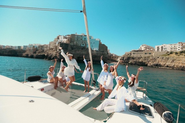 Visit Polignano's Catamaran Trip with Aperitif and Snacks in Polignano a Mare, Puglia