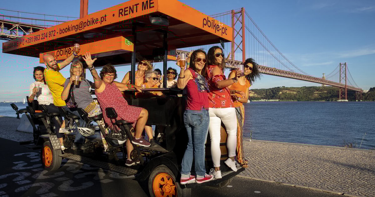 Fun beer bike by the seafront in Lisbon GetYourGuide