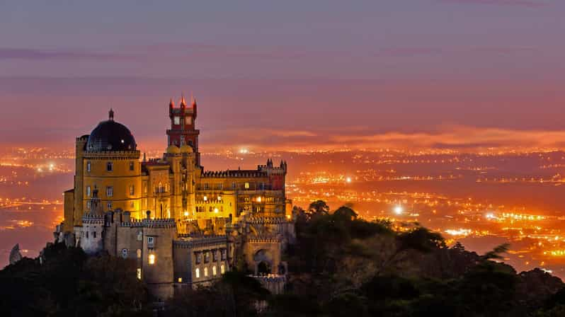 From Lisbon: Pena Palace, Regaleira, Sintra & Cascais Tour | GetYourGuide