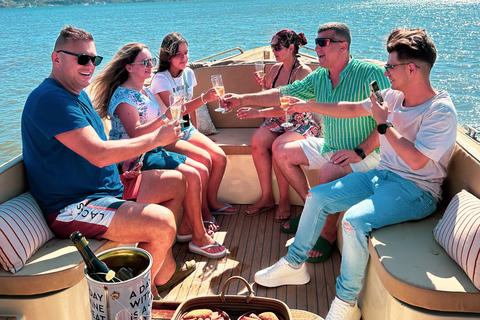 Lisbon Exclusive Sunset Cruise – Pizza, Open Bar & Dolphins Lisbon: Sunset Cruise–Pizza, Open Bar & Dolphins 2h