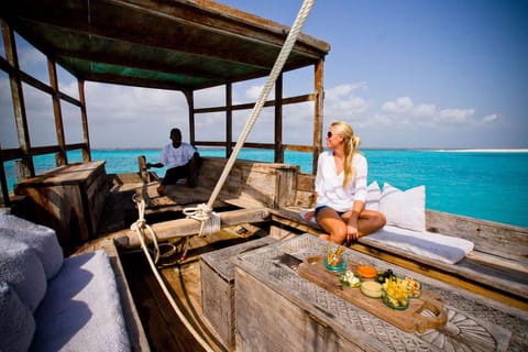 Snorkeling to mnemba + dolphin Full day (sharing Boat)