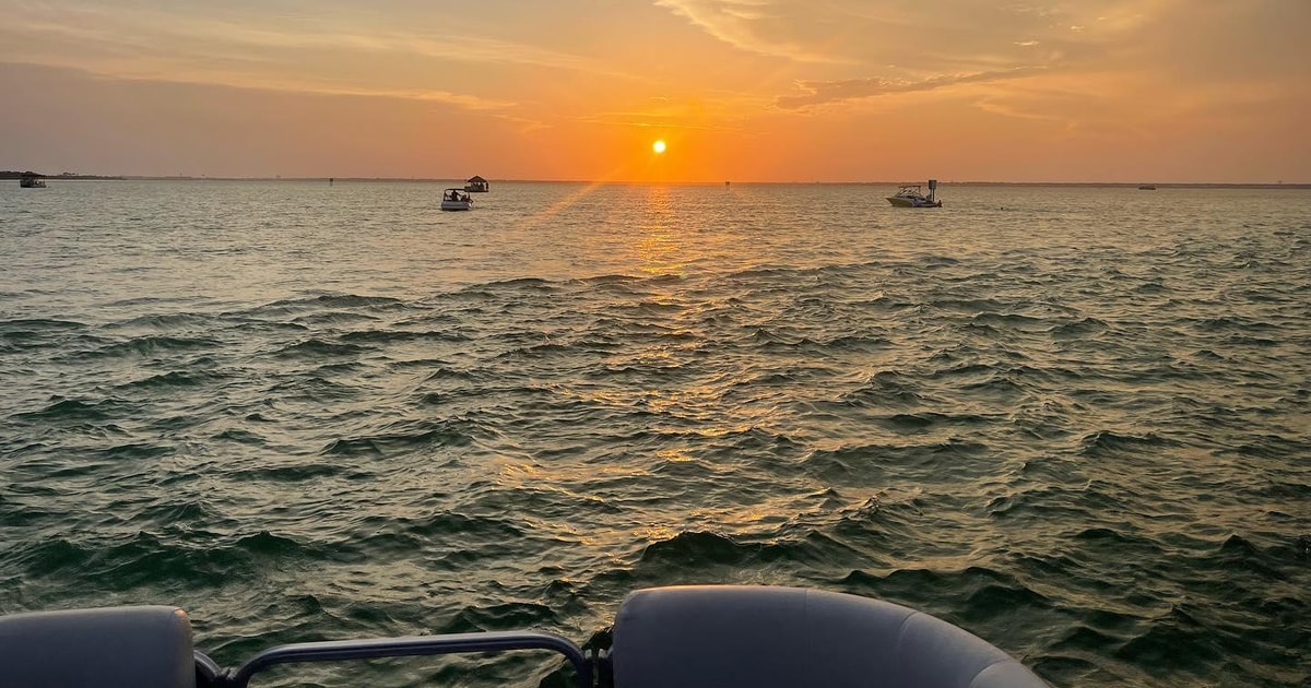 Florida: Emerald Coast Sunset & Dolphin Cruise with Guide | GetYourGuide