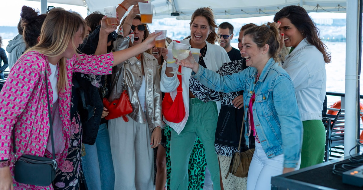 Lisbon: Boat Party Day, Sunset, or Night w/ Music & Open Bar | GetYourGuide