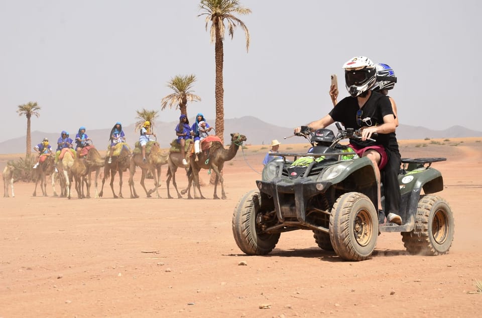 From Marrakech Desert Sunset Quad Tour And Camel Ride Getyourguide