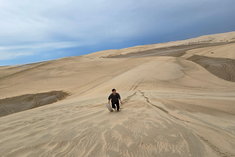 Sunrise or Sunset desert Safari with Sandboarding in Qatar