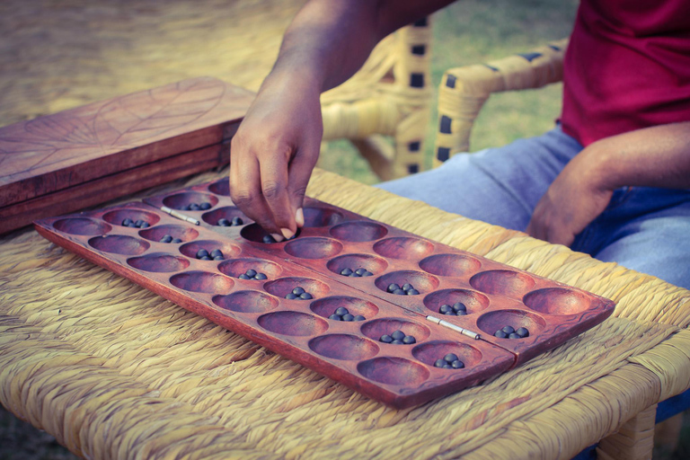 Learn Rwandan Table Game (IGISORO) with a LocalIGISORO Traditional Rwandan Board Game Experience