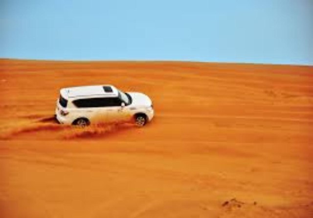Visit Dubai Desert Safari With Dinner, Camel & Sandboard Ride in Dubai