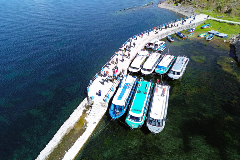 From Puno: Lake Titicaca 2-Day Tour with Homestay From Puno: 2-Day Guided Tour with Fixed Pickup Point