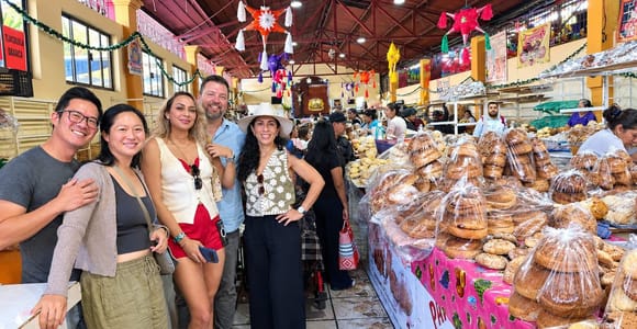 Market baskets filled with chillies, herbs, bread and handmade goods in Tlacolula