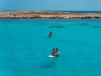 Ibiza: Crociera in barca a Formentera con pagaia, snorkeling e pranzo