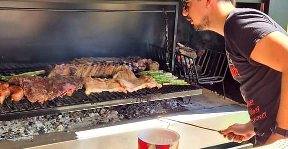 Enjoy a local asado in the Boedo neighborhood