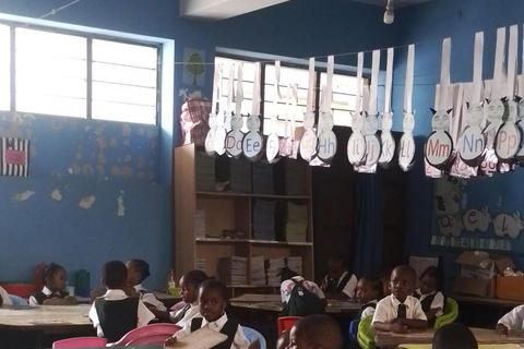 Zanzibar: Stone Town Tour and School Visit with Hassan Discover Town and School Visit with Hassan