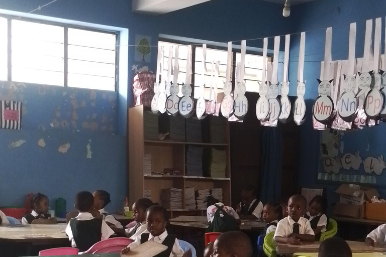 Zanzibar: Stone Town Tour and School Visit with Hassan Discover Town and School Visit with Hassan