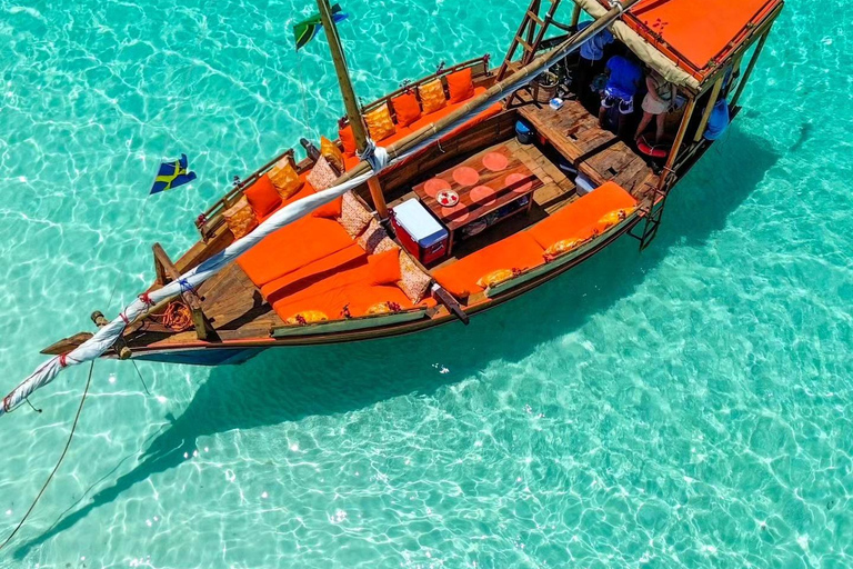 Mnemba Island Dhow Snorkeling, Dolphins, Bbq Lunch, Sailing Sharing Mnemba Island Snorkeling Trip with Bbq Lunch