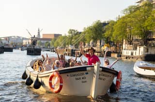 Amsterdam: 90-minütige Bootsfahrt mit ortskundigem Guide & unbegrenzten Drinks