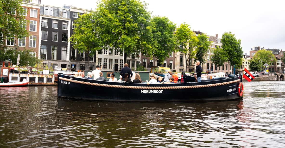 Afbeelding 17 van Amsterdam: begeleide open boottocht met onbeperkt drankjes