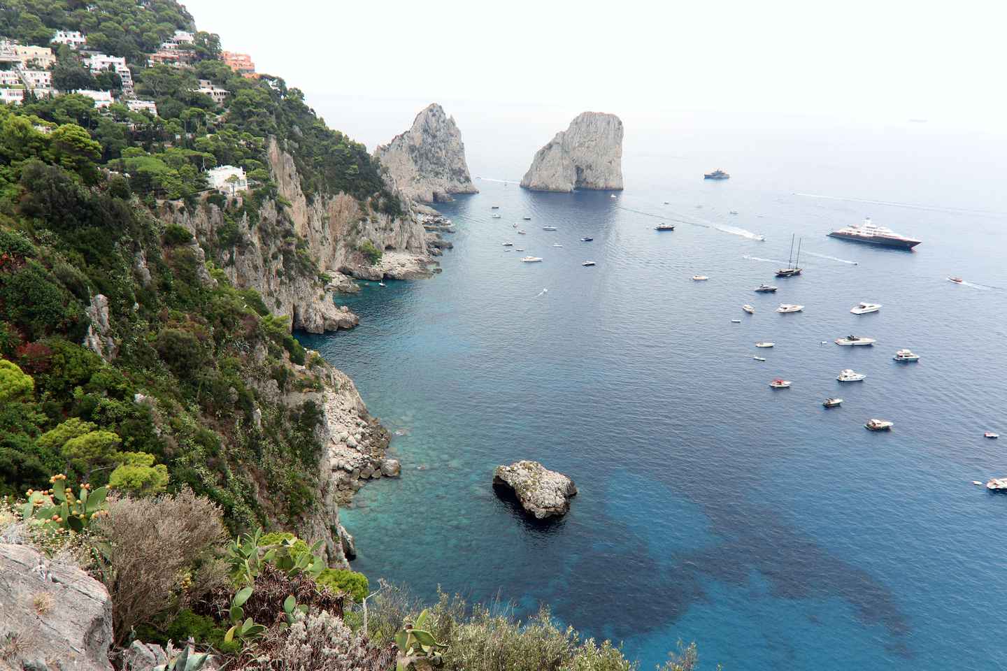 Capri: Faraglioni and Grottoes with Guided Island Tour
