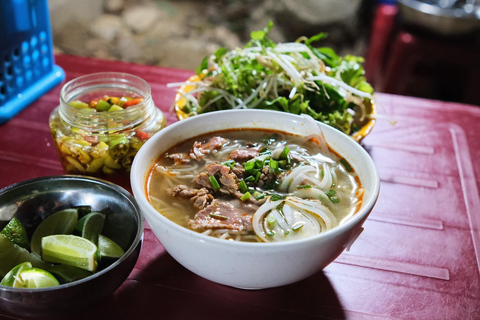 Hue Evening Foodie Cyclo Tour & Folk Music on Perfume River