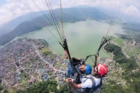 Pokhara: Thrilling Paragliding Experience with Photo & Video